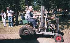 Jim riding the tractor